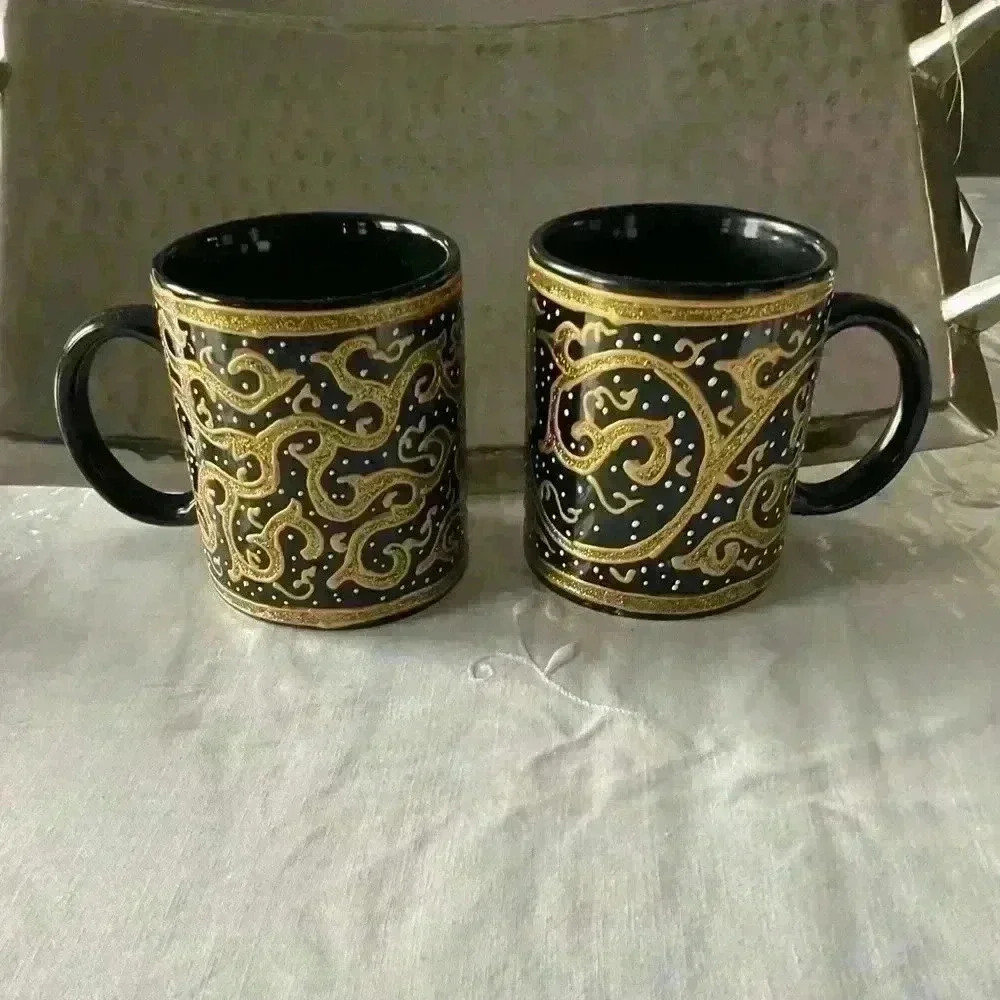 2 antique hand painted and very unique mugs